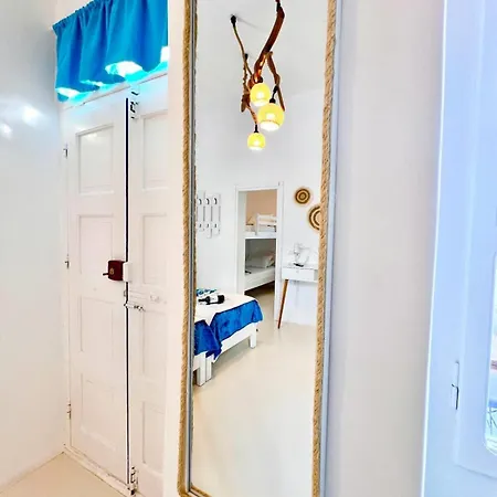 Aphrodite Next To The Windmills Of Mykonos